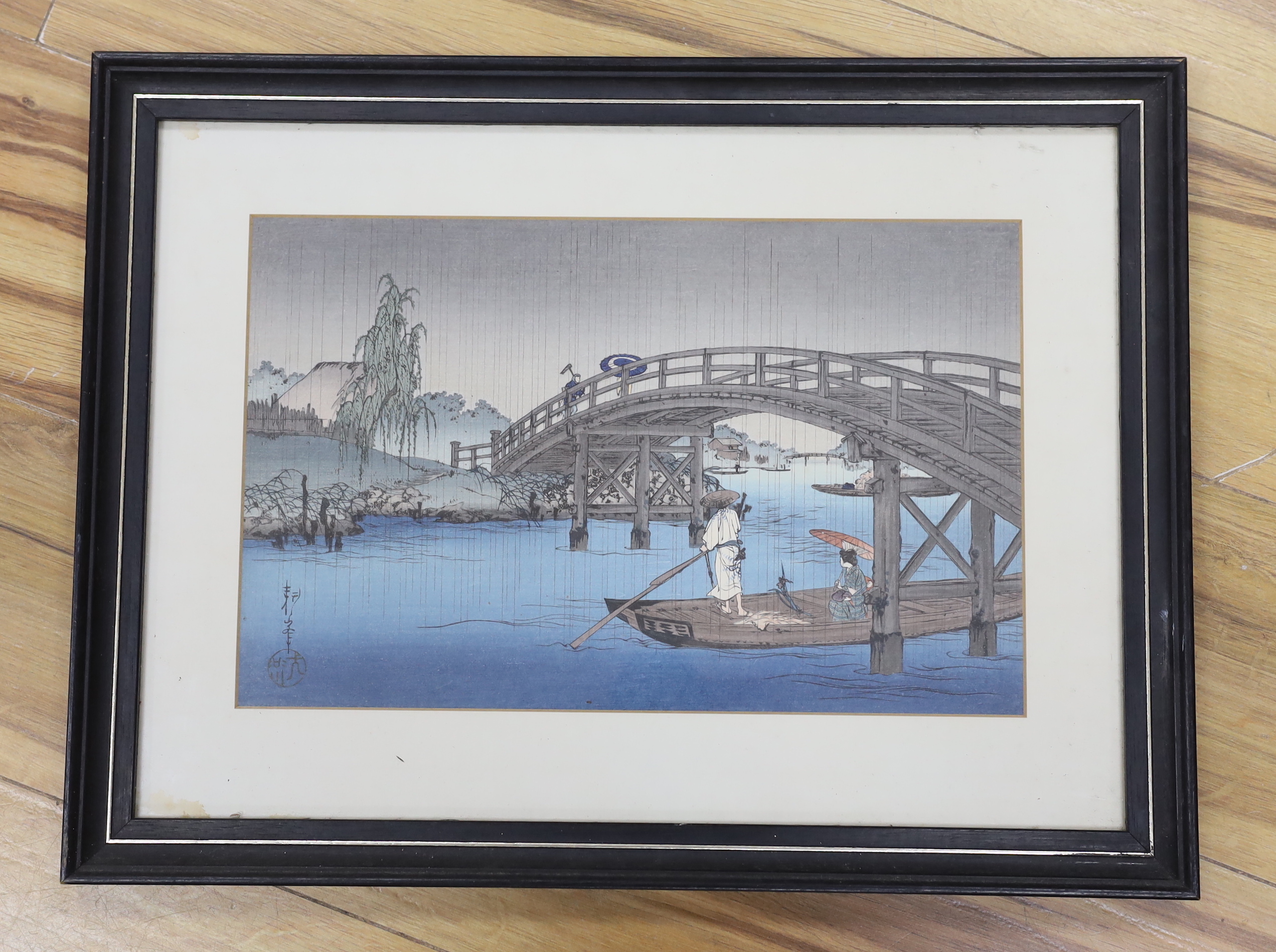 After Shoda Koho (1871-1946), Japanese woodblock print, Bridge in the rain, 22 x 34cm